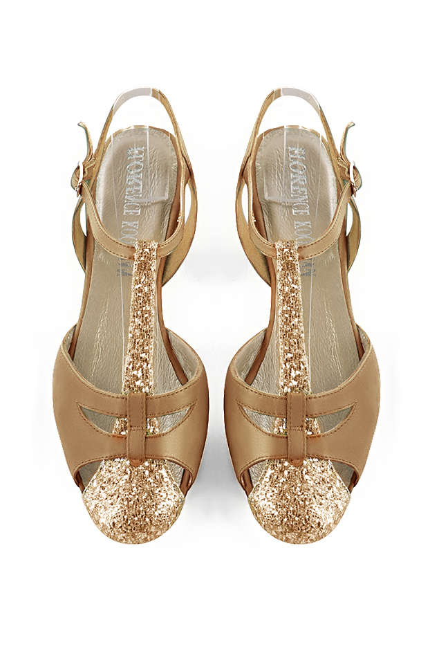 French elegance and refinement for these gold and camel beige dress open back T-strap shoes, 
                available in many subtle leather and colour combinations. This charming flat salomé will nicely replace a more conventional ballerina.
Absolute comfort and singularity for this favorite model !  
                Matching clutches for parties, ceremonies and weddings.   
                You can customize these shoes to perfectly match your tastes or needs, and have a unique model.  
                Choice of leathers, colours, knots and heels. 
                Wide range of materials and shades carefully chosen.  
                Rich collection of flat, low, mid and high heels.  
                Small and large shoe sizes - Florence KOOIJMAN